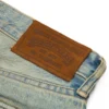 Pantalones de Denim Cotton Wreath de corte recto con lavado sucio
